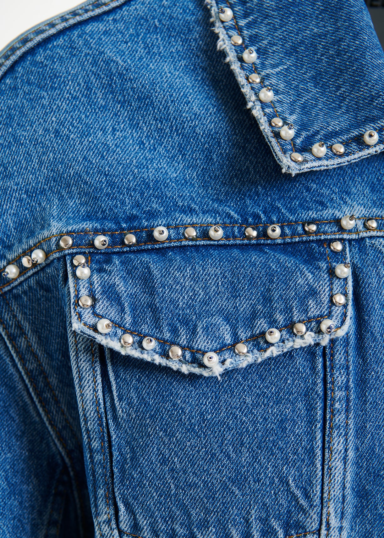 Idolized embo denim jacket